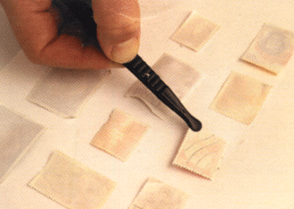 Отделение почтовых марок и просушка их